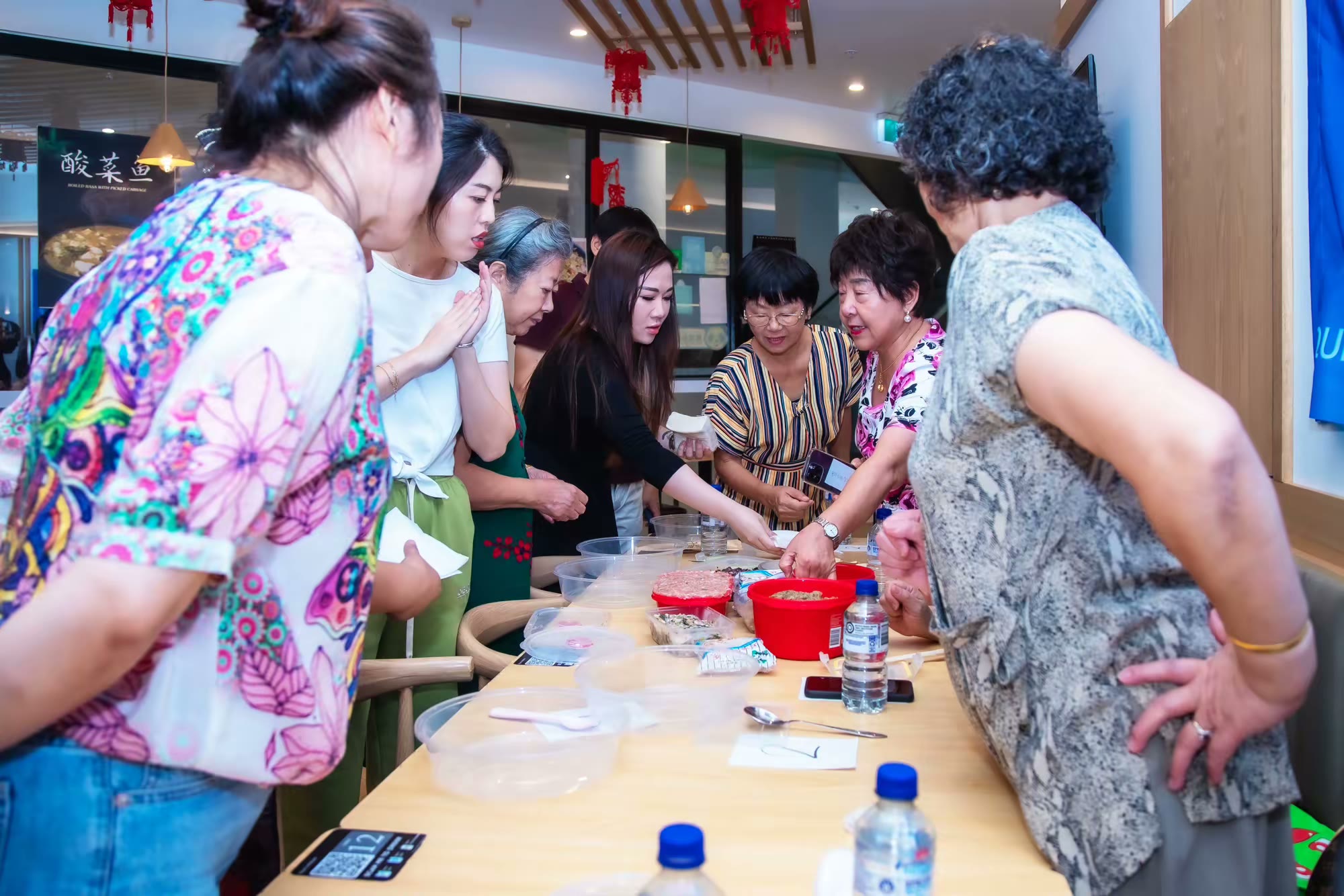 Wonton-making competition, event photograph 40