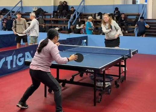 A table tennis rally at the second Magnolia Cup